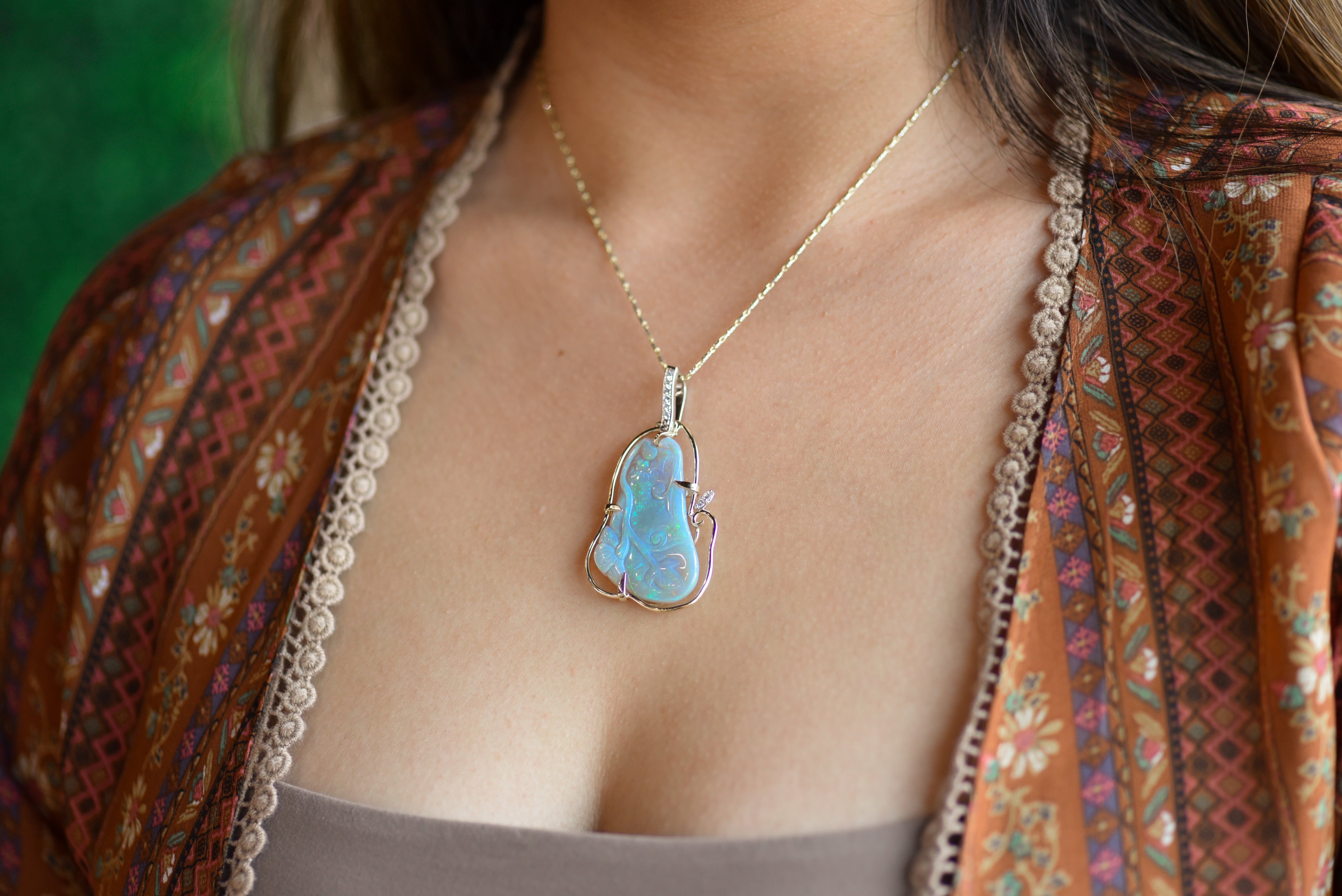 Carved opal pendant store